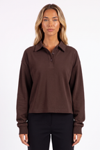 Brown long-sleeve cropped polo top — collar and placket detail